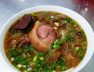 Tô bún bò giò heo nước lèo đỏ óng